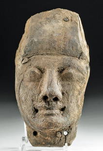 Egyptian New Kingdom Cedar & Painted Gesso Mummy Mask: Ancient Egypt, New Kingdom to Third Intermediate Period, 19th to 25th Dynasty, ca. 1292 to 656 BCE. A beautiful example of a hand-carved cedar wood mummy mask with attractive graining and faint