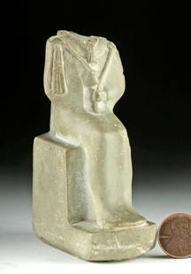 Egyptian Late Dynastic Stone Figure - Seated Osiris: Egypt, Late Dynastic to Ptolemaic period, ca. 664 to 30 BCE. A lovely depiction of the god of the underworld Osiris, hand-carved from a matte pistachio-green stone with brown inclusions. Osiris sits