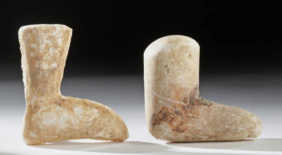 Pair of Greek Cycladic Marble Limbs - Arm & Foot: Ancient Greece, Cycladic (final Neolithic) period, ca. 2600 to 2300 BCE. A fine set of two anthropomorphic limbs - an arm and a leg - hand-carved from chalky yellow-white marble. The smaller limb