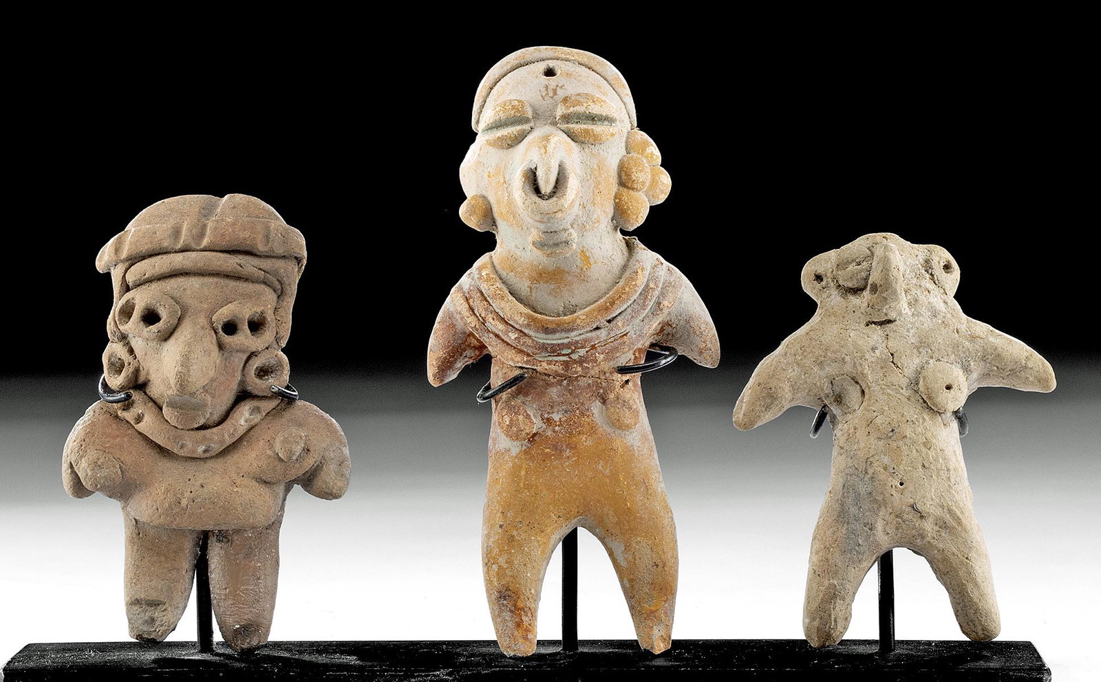 Lot of 3 Tlatilco Pottery Standing Venus Figures: **First Time At Auction** Pre-Columbian, Valley of Mexico, Tlatilco culture, ca. 1200 to 800 BCE. A fine gathering of three hand-built pottery Venus or 'pretty lady' figures from different time period