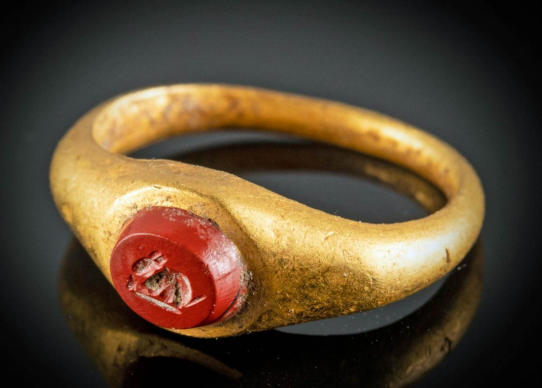 Roman 22K+ Gold Ring w/ Jasper Intaglio Rabbit: Roman, Imperial Period, ca. 1st to 2nd century CE. Lovely and wearable 22K+ (95%) gold ring with a large, ovoid, jasper intaglio of a rabbit - the intaglio presenting rich red hues, set into an over-s