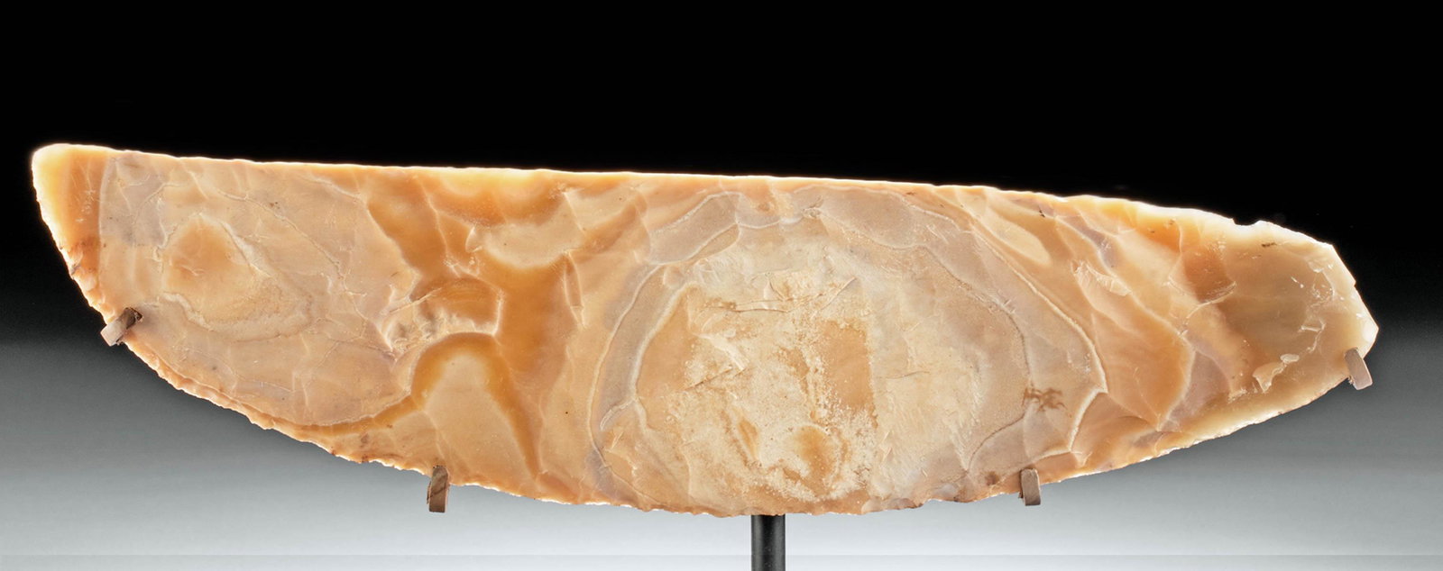 Huge Egyptian Pre-Dynastic Naqada III Flint Knife Blade: Ancient Egypt, Pre-Dynastic Period, Naqada III, ca. 3200 to 3000 BCE. An exquisite example of a lengthy knife blade meant as a hand tool or to be used as a short scythe on the end of a wooden rod. The