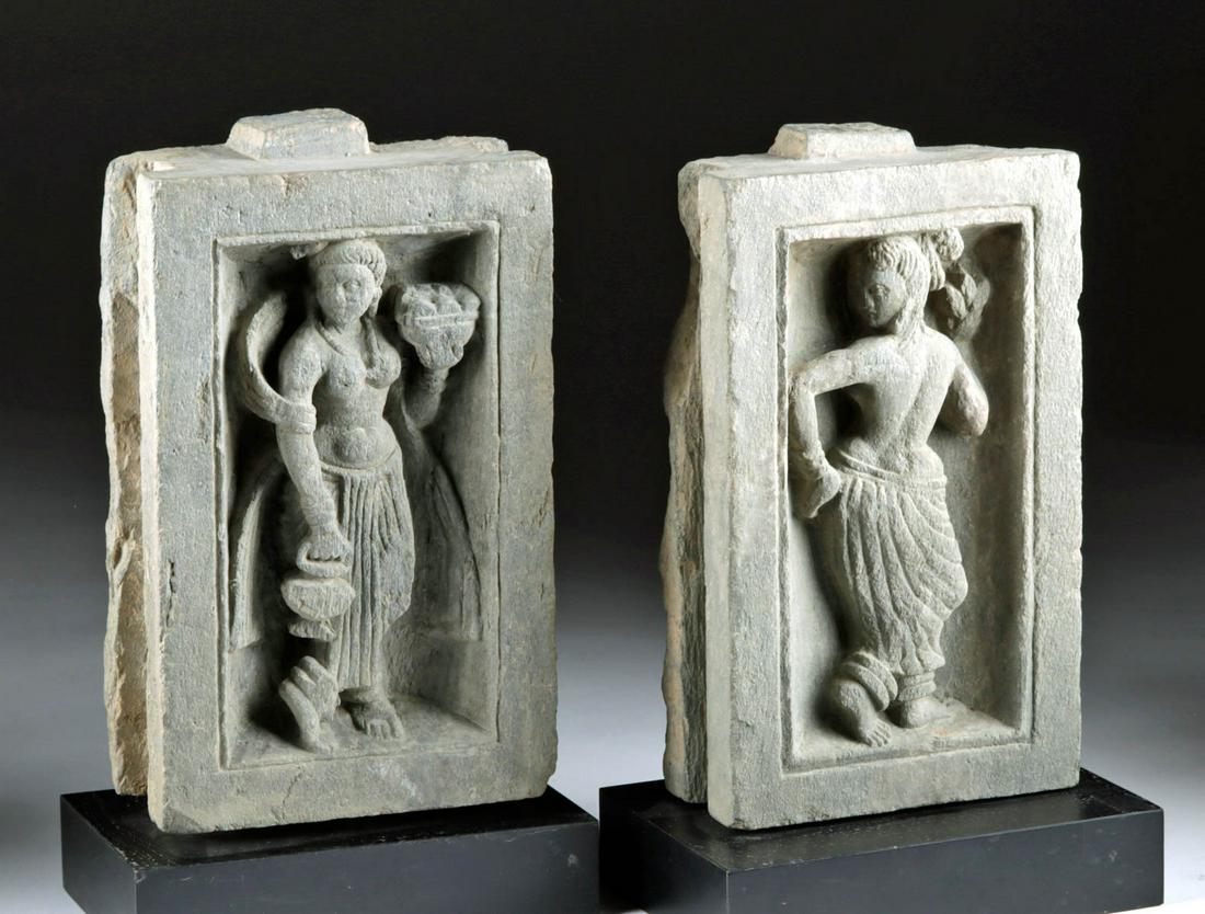 Gandharan Schist Panels Female Dancers, ex-Sotheby's: Central Asia, Pakistan and Afghanistan, Gandharan Empire, ca. 200 BCE to 100 CE. A pair of fantastic, sensual female dancers, each in high relief in a deep rectangular panel. One's body is turned away