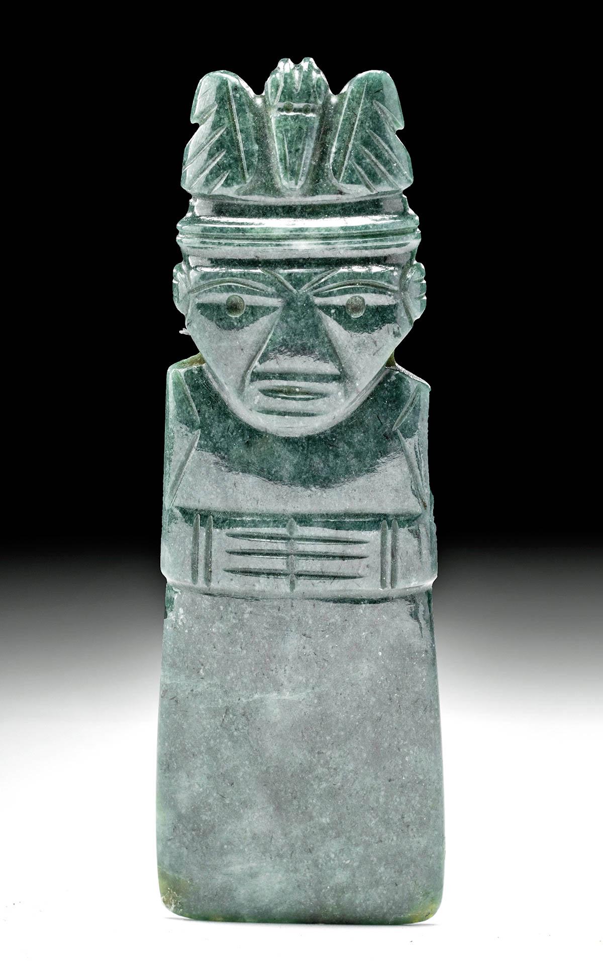 Superb Costa Rican Jade Celt - Man w/ Bird Headdress: Pre-Columbian, Costa Rica, Guanacaste-Nicoya, ca. 250 to 800 CE. Finely carved and string cut from jadeite of rich verdant hues, an axe god celt presenting an anthropomorphic visage with a magnificent