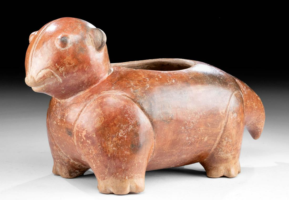 Chorrera Redware Vessel Abstract Zoomorph: Pre-Columbian, Ecuador, Chorrera culture, Late Formative Period, ca. 800 to 400 BCE. A hand-built redware pottery vessel in the form of an abstract zoomorphic creature, perhaps a portly feline or a pe
