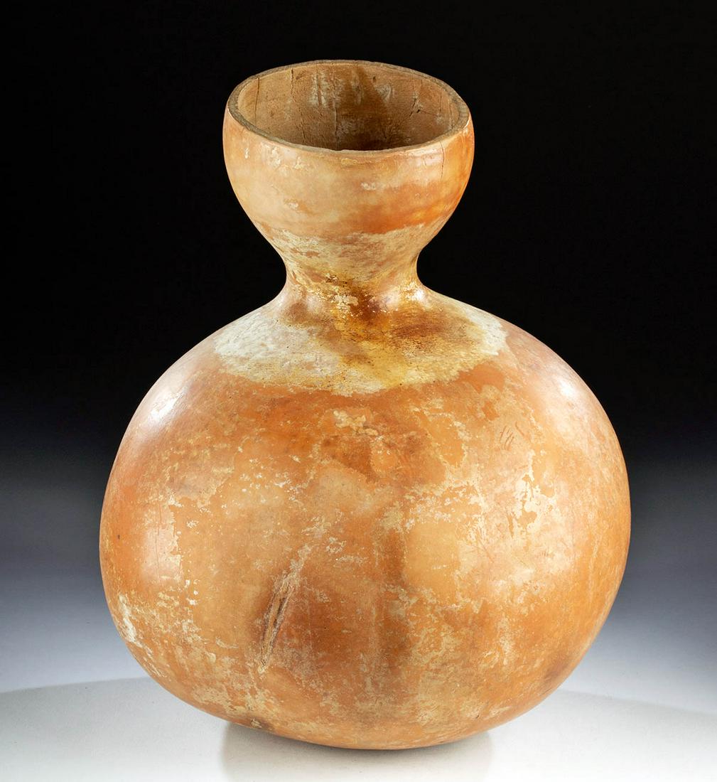 Early 20th C. Hawaiian Gourd Drum (ipu heke 'ole): Polynesia, Hawaiian Islands, Maui, ca. early to mid 20th century CE. A beautifully aged gourd drum, known as an "ipu heke 'ole", made from a single gourd hollowed, dried, polished with sand, and cut a