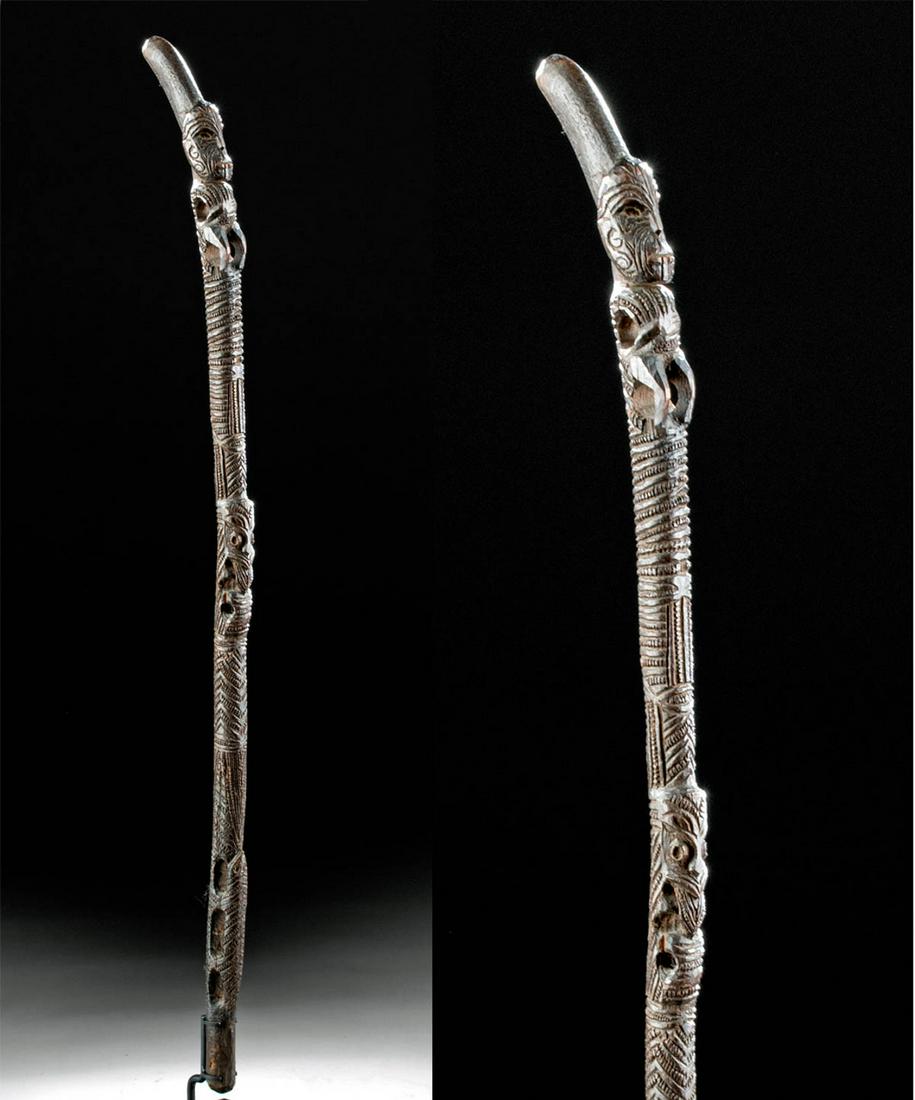 19th C. Maori Wood Orator's Walking Staff / Tokotoko: Oceania, New Zealand, Maori people, ca. 19th century CE. Wow! An incredible hand carved, dark wooden tokotoko, long and straight aside from a gently curved upper end. The tokotoko is a traditional Mao