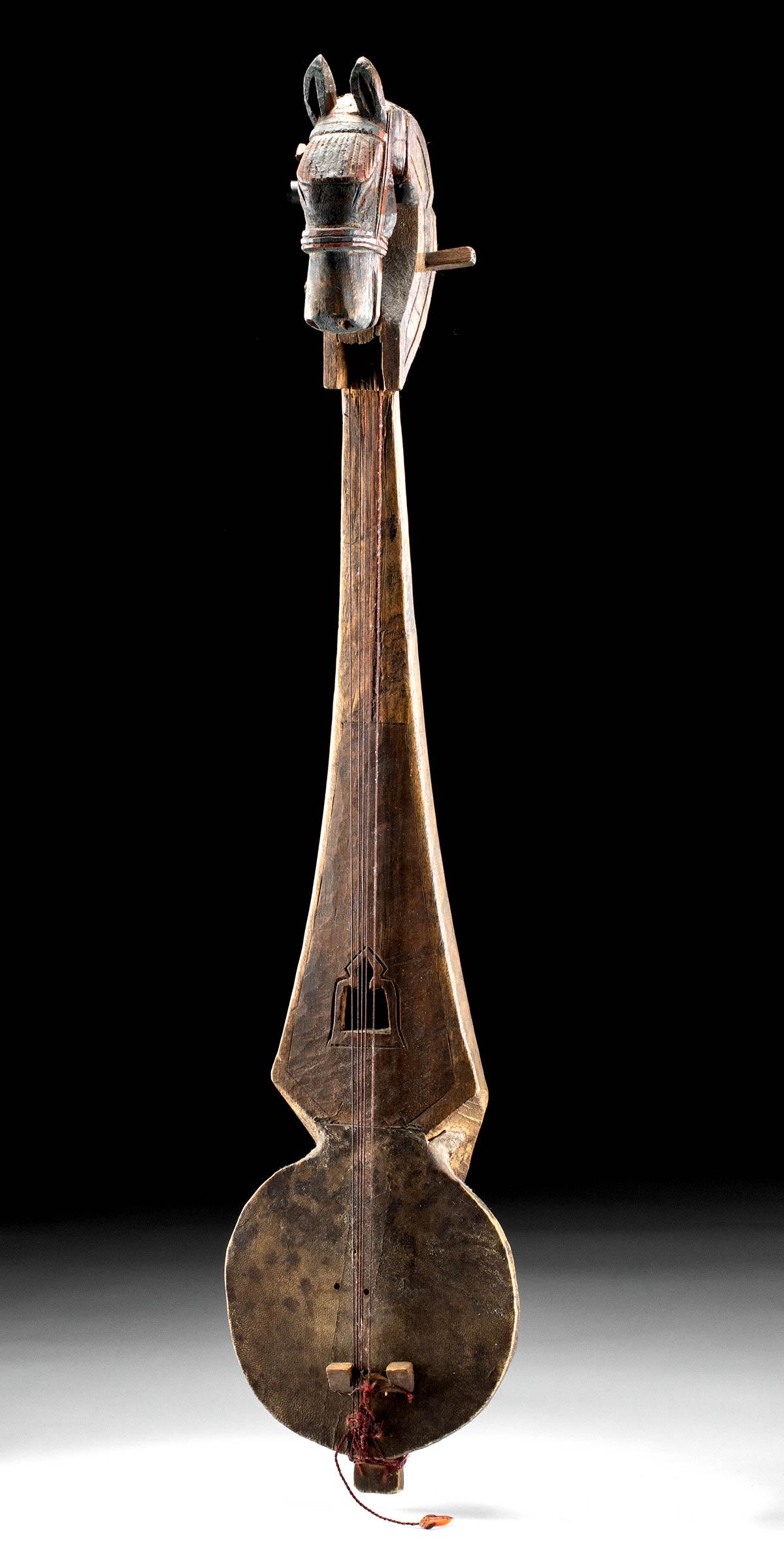 Early 20th C. Nepalese/Tibetan Wood Lute (Sgra-Snyan): Nepal or Tibet, ca. early 20th century. A lovely wooden lute known as a sgra-snyan (also danyen, dramyen, danyan - and meaning "harmonious sound") with a wonderful hand-carved and beautifully painted 