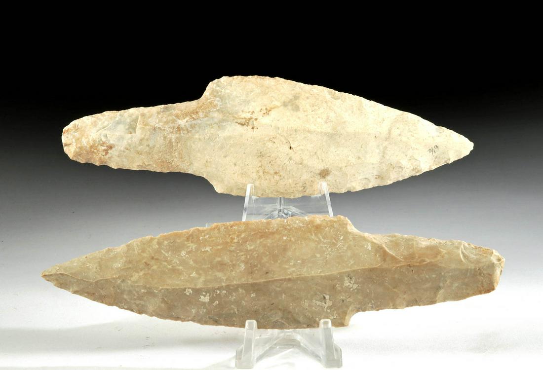Maya Knapped Chert Daggers from Belize (2): Pre-Columbian, Belize, Maya, Late Classic Period, ca. 550 to 900 CE. A set of two handsome daggers, each hand-knapped from chert of either creamy-white or smoky beige hues. Both daggers have a thick h