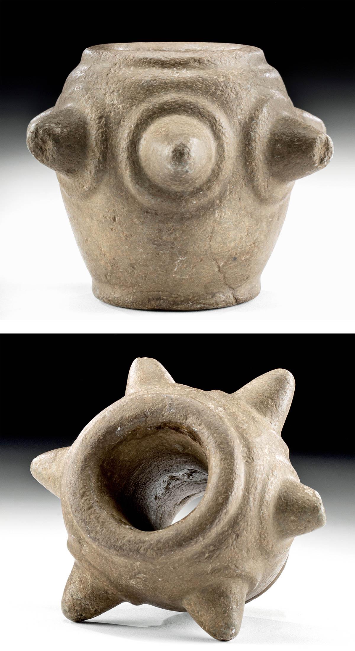 Chavin Stone Mace Head w/ Spikes: Pre-Columbian, North Coast Peru, Chavin, ca. 900 to 500 BCE. A large stone mace head made from a heavy, dark-brown stone. The conical base has a central socketing hole which widens towards the top. Si