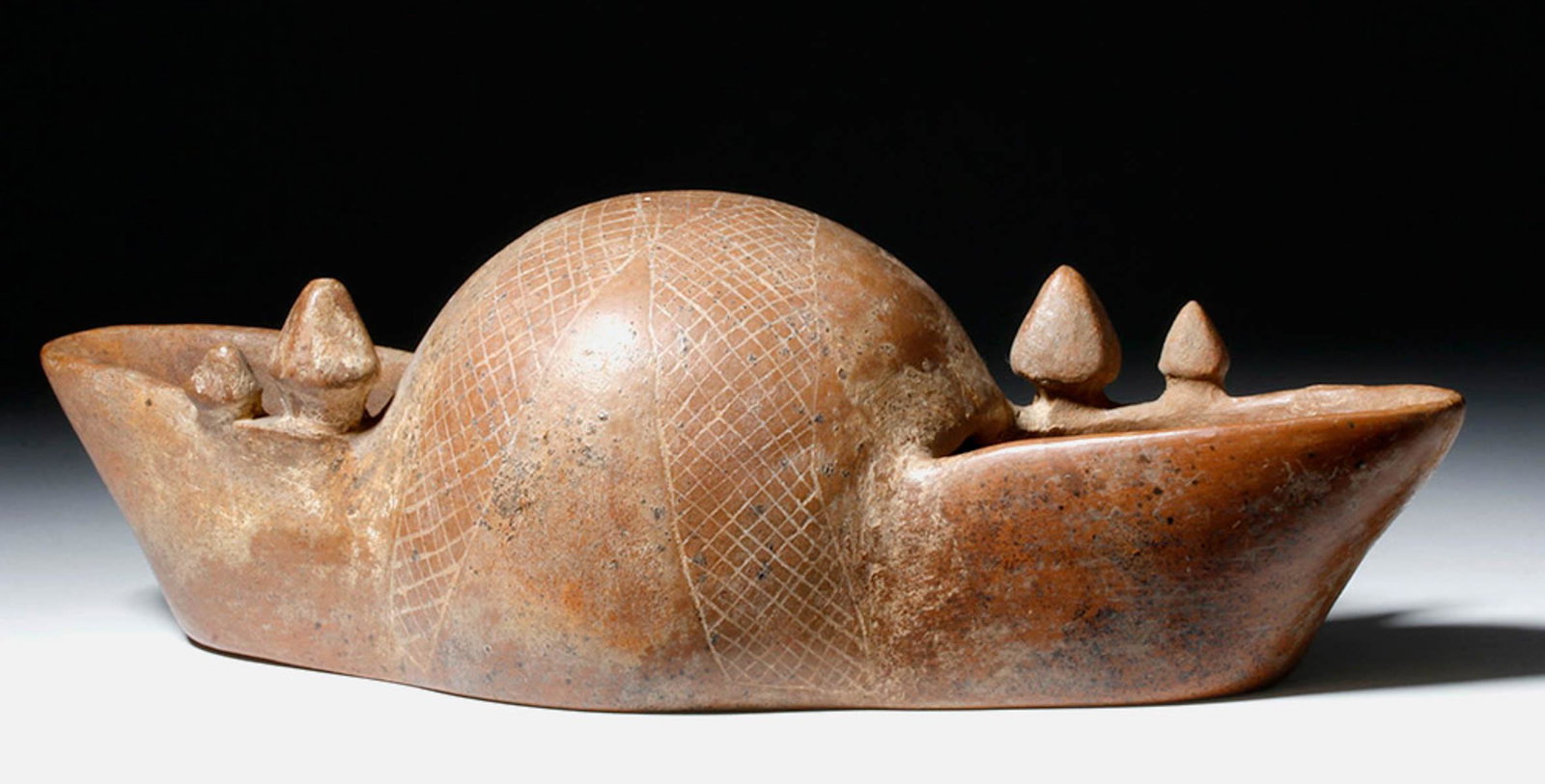 Rare Colima Pottery Vessel - Hut Form: Pre-Columbian, West Mexico, Colima, ca. 200 BCE to 200 CE. An unusual terracotta vessel, modeled to represent a vernacular architectural structure of the ancient Colima culture comprised of a central 