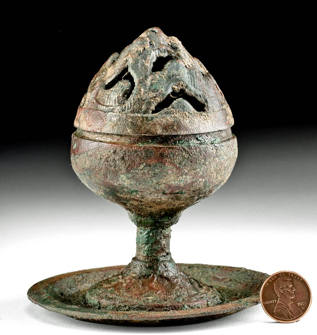 Chinese Han Dynasty Leaded Bronze Stemmed Censer w/ Lid: East Asia, China, Han Dynasty, ca. 206 BCE to 220 CE. A cast leaded-bronze censer of a bulbous form resting atop a concave circular foot and a slender stem. The hemispherical body features a deep basi
