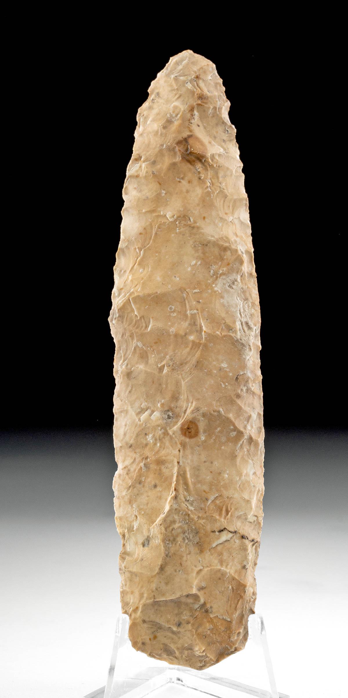 Neolithic European Flint Dagger, ex Piscopo: Northern Europe, Denmark, Neolithic period, ca. 3900 to 1700 BCE. A lovely knapped chert (flint) dagger of a pale orange reddish hue and slender profile. Although millennia old, the dagger still retai