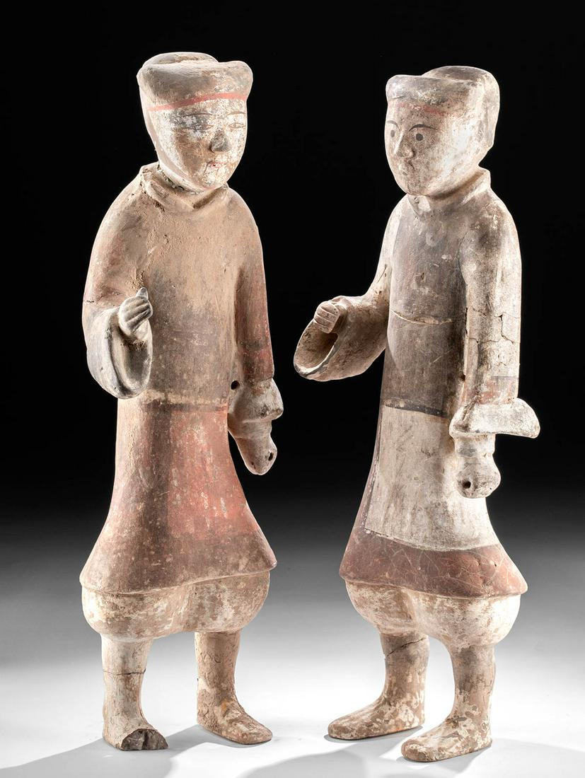 Lot of 2 Chinese Han Polychrome Tomb Attendants w/TL: East Asia, China, Western Han Dynasty, ca. 200 BCE to 200 CE. A wonderful pair of female tomb attendants - both skillfully mold-made from light grey earthenware and painted in white, black, and red. T