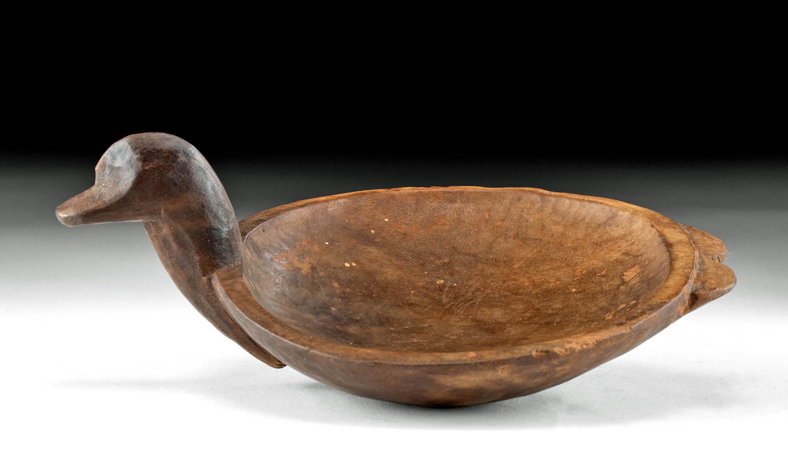 Adorable Inca Wooden Tray - Duck Form: Pre-Columbian, South/Central Coast Peru, Inca Empire, ca. 1200 to 1532 CE. A rare, well-preserved, hand-carved wooden vessel in the form of a duck, used in part of the preparation of snuff. The tray h