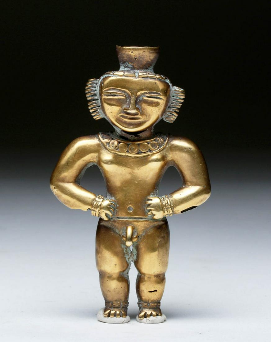 Quimbaya 18K Gold Poporo Depicting Cazique, 110 Grams: Pre-Columbian, Colombia, Quimbaya, ca. 1st to 7th century CE. A high karat gold (18 kt) figural poporo in the form of a nude, male Cazique, proudly standing with hands on hips, presenting a frontal, s