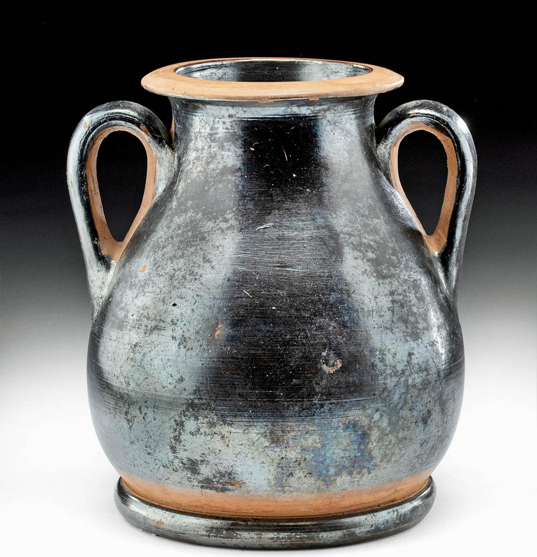 Stunning Greek Attic Blackware Pelike Highly Iridescent: Magna Graecia, southern Italy, probably Campania, middle of the 4th century BCE. A truly wonderful example of the incredible iridescence Greek pottery develops over 24 centuries. Squat pelike, used fo