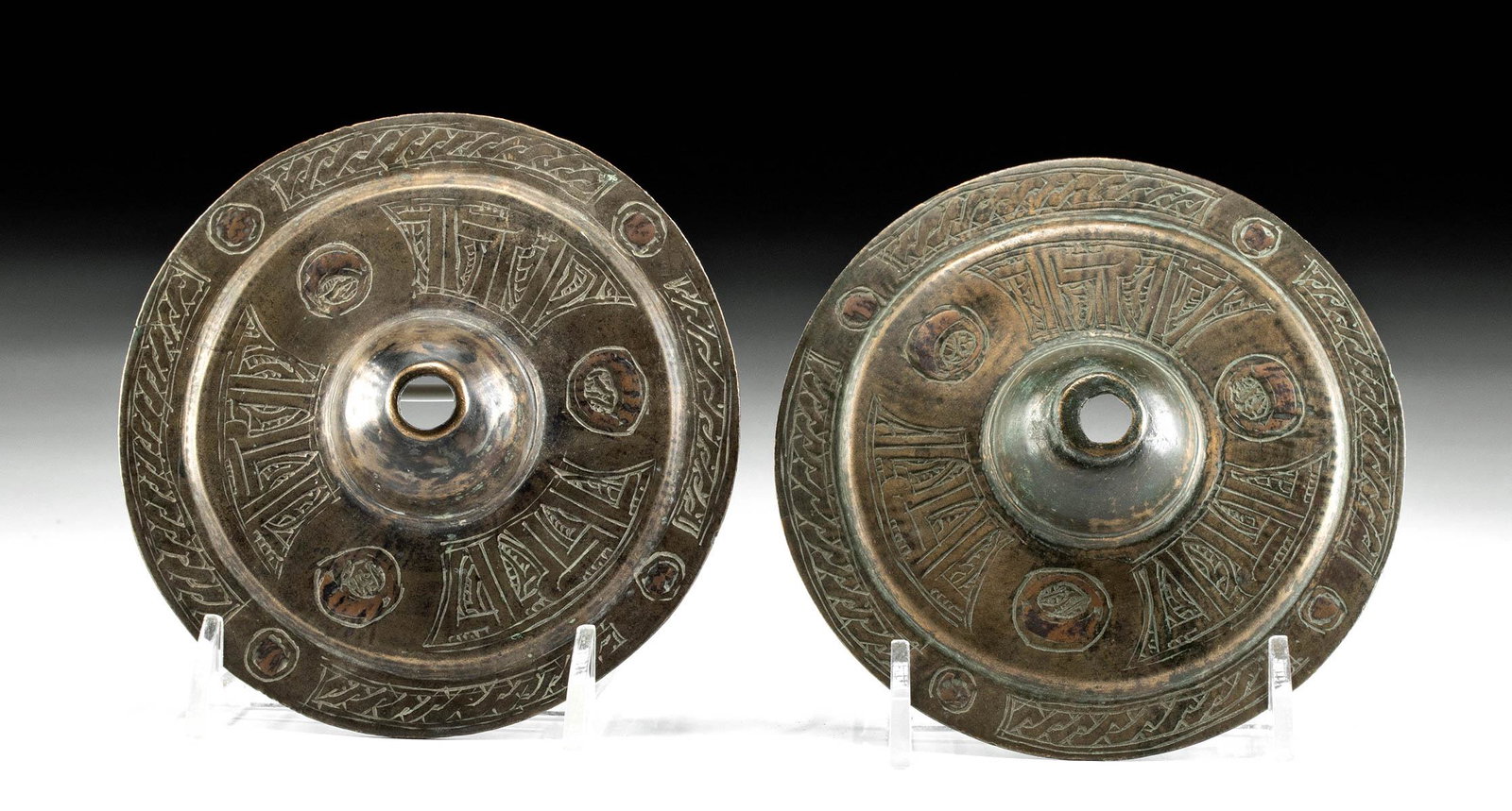 10th C. Seljuk Bronze Horse Identification Discs: Medieval Middle East/Central Asia, Persia, modern day Turkey, Seljuk (Seljuq) Empire, ca. 10th to 12th century CE. A pair of hammered bronze ornamental discs used as horse identification tags. The con
