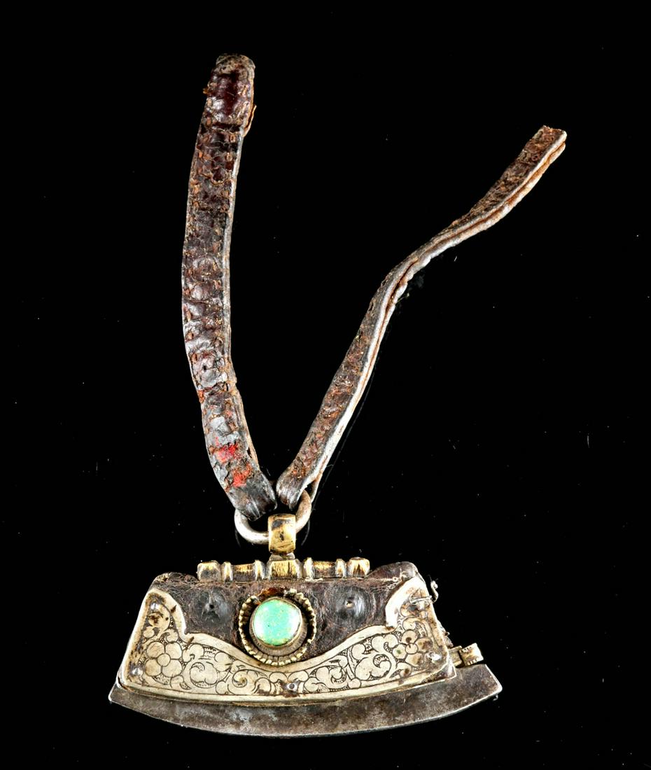 20th C. Tibetan Leather, Steel, & Brass Tinder Pouch: **Originally Listed At $200** Central Asia, Tibet, ca. early to mid 20th century CE. A fine leather tinder pouch with a folding flap adorned with a circular greenstone fragment, a steel striking blade
