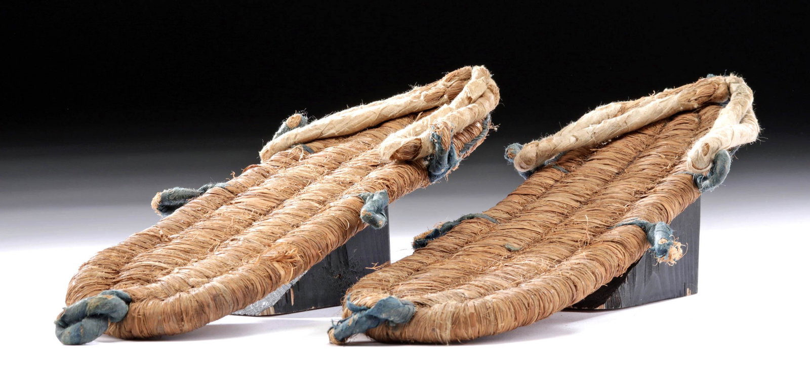 17th C. Japanese Edo Woven Fiber Waraji / Sandals (pr): **Originally Listed At $150** East Asia, Japan, Edo period, ca. 1603 to 1868 CE. A finely preserved pair of waraji (sandals) that are formed from rough straw fibers woven around a central fibrous core
