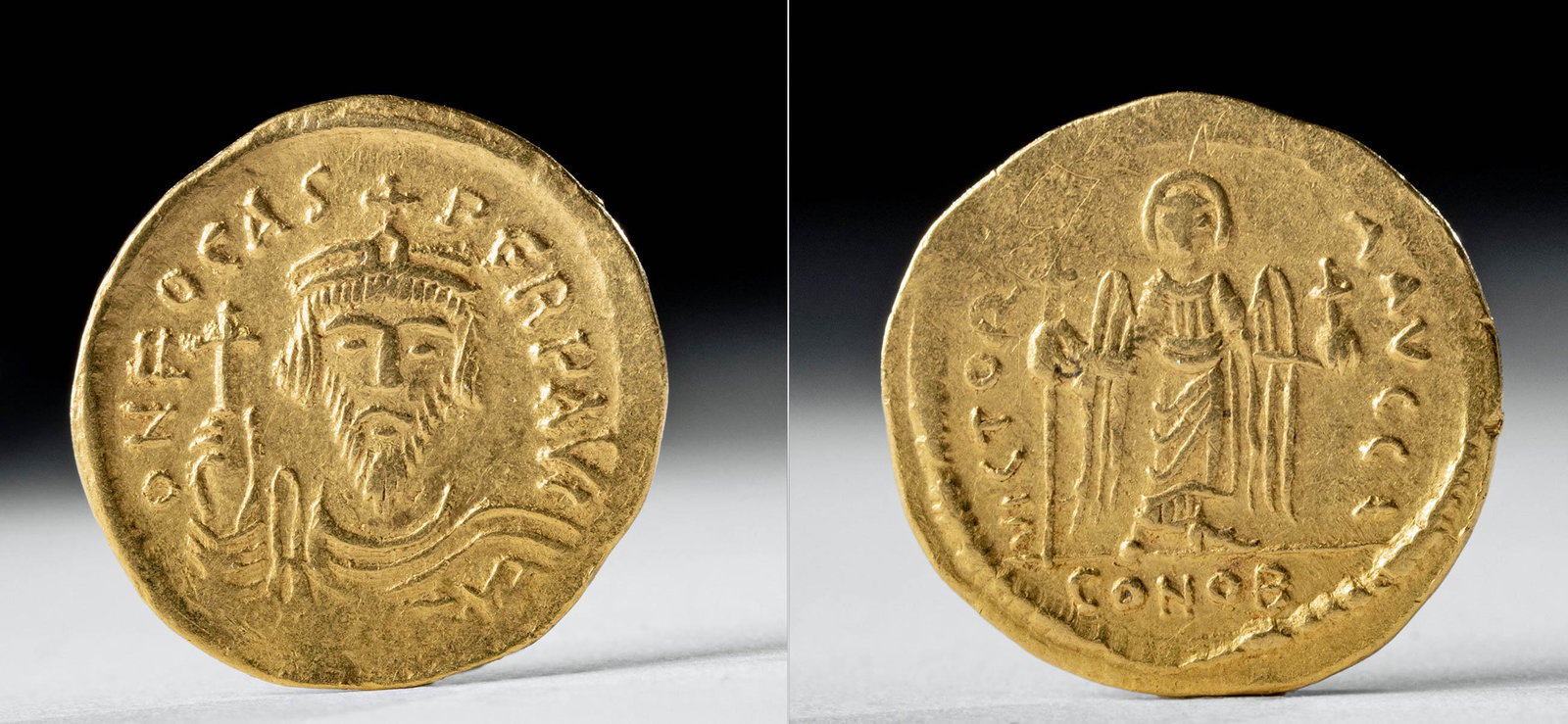 Western Roman Gold Solidus of Phocas - 4.3 g: Byzantine Empire, Phocas, ca. 603 to 607 CE. Gold solidus. Constantinople mint. Obverse: Crowned and cuirassed facing bust, holding globus cruciger. Reverse: Angel standing facing, holding staff surmo