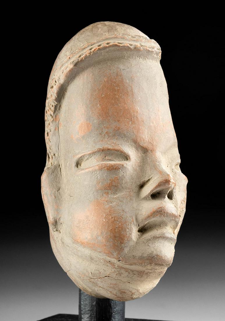 Fine Olmec Tltatilco Tlapacoya Pottery Head: Pre-Columbian, Mexico, Olmec period, Tlatilco people, Tlapacoya site, ca. 1250 to 800 BCE. A wonderful Olmecoid Tlapacoya terracotta head, skillfully modeled with mesmerizing traits. The characteristi