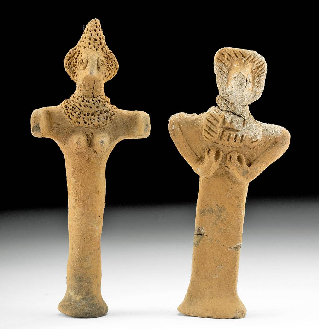 Two Syro-Hittite Terracotta Standing Astarte Figures: Ancient Near East, Northern Syria, Syro-Hittite culture, ca. 3rd millennium BCE. A pair of hand-built terracotta idol figures meant to represent Astarte, a goddess known throughout the ancient Near Ea