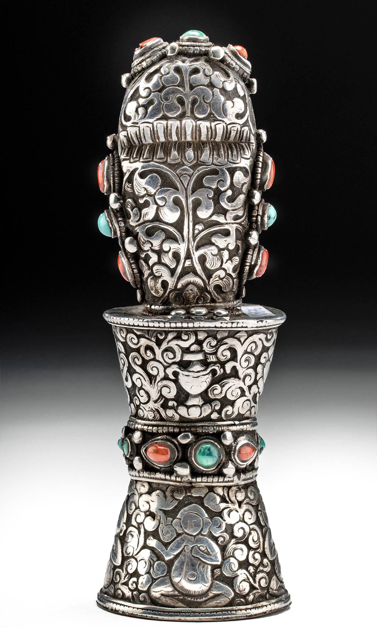19th C. Tibetan Silver & Stone Monastery Seal: Central Asia, Tibet, ca. 19th to early 20th century CE. A fine monastery seal constructed from 80% to 90% silver with a stylized panel of incised Tibetan characters on the base. The spool-shaped lower
