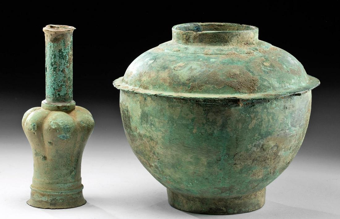 Chinese Han Dynasty Bronze Vessel of Onion Form: East Asia, China, Han Dynasty, ca. 206 BCE to 220 CE. A fascinating multi-component cast bronze vessel with a tall spout that flares outward in a four-lobed "onion" form at its center before narrowing