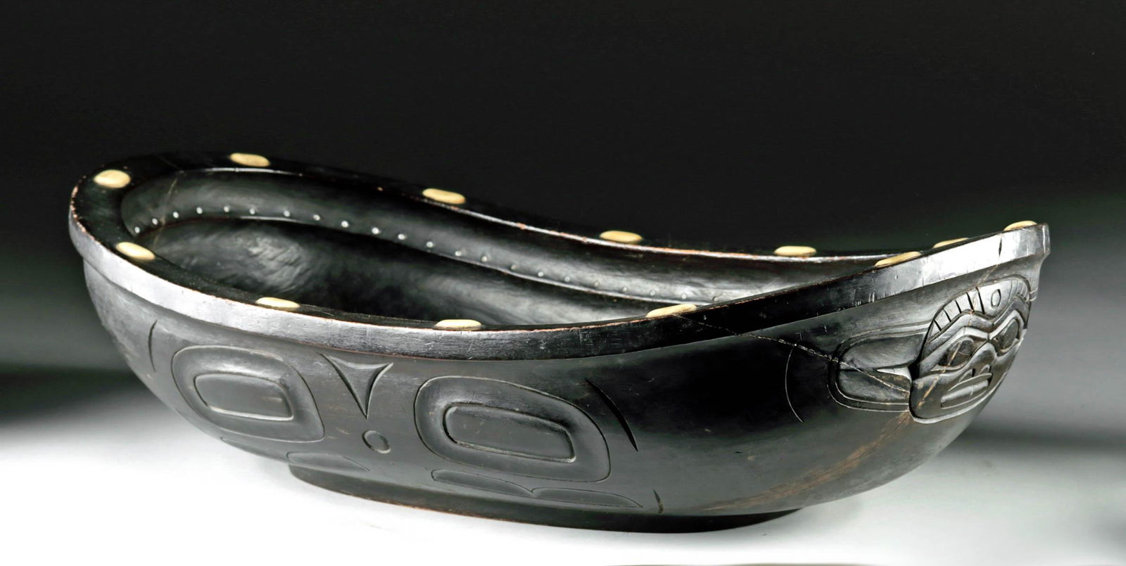 Published 1919 Tlingit Wood Frog Bowl - Augustus Bean: **Originally Listed At $6000** Augustus Bean (Tlingit, 1850-1926), inscribed "Sitka (Alaska) 1919" on bottom. An exceptional oval feast dish carved from wood and skillfully decorated with low relief c