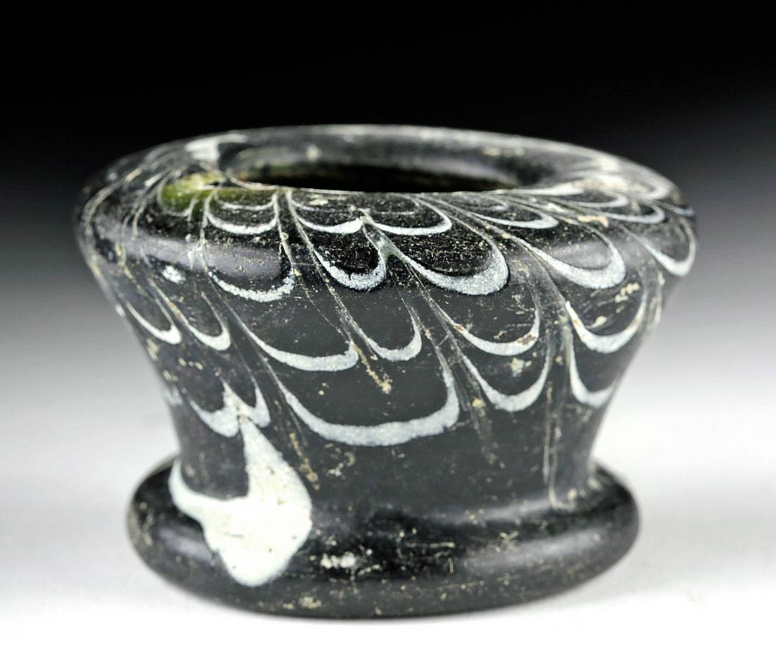 12th C. Islamic Ink Well Marbled Glass: **Originally Listed At $1200** Ancient Near East, Islamic, ca. 12th to 14th century CE. A stunning example of a rounded ink well with a tapered body that terminates in a petite discoid foot and a wide