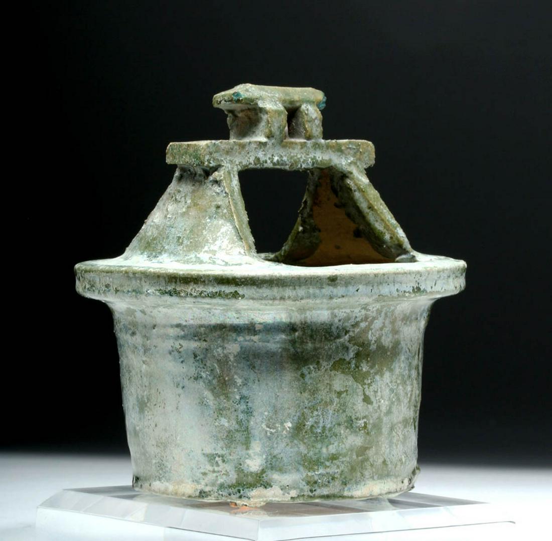 Chinese Han Dynasty Glazed Pottery Well Model: **Originally Listed At $850** China, Han Dynasty, ca. 206 BCE to 220 CE. A heavy, hollow piece of pottery, with its exterior glazed in a thick, deep green - its surface presenting a silvery iridescent