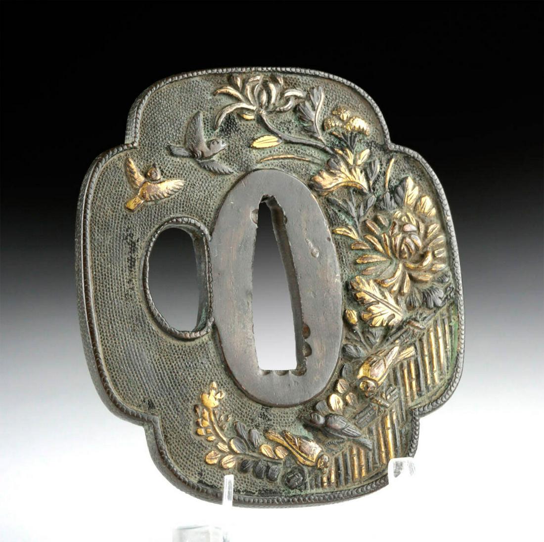 18th C. Japanese Gilded Iron Tsuba with Birds & Flowers: **Originally Listed At $500** East Asia, Japan, late Edo Period, ca. 18th to 19th century CE. A beautiful forged-iron tsuba, a roughly square-shaped hand guard with rounded corners traditionally emplo