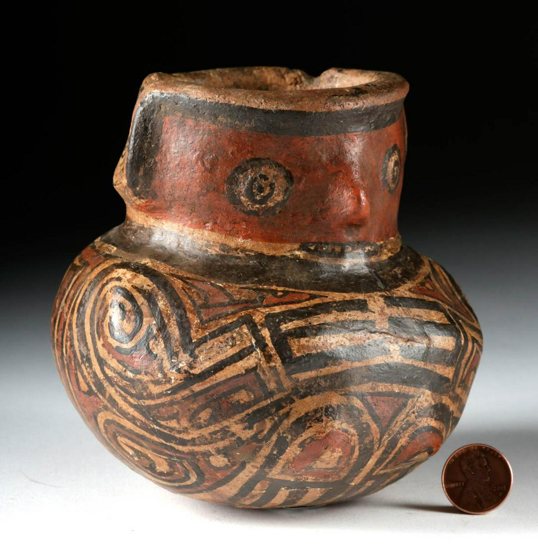 Cocle Polychrome Effigy Jar - Human & Saurian Motifs: **Originally Listed At $400** Pre-Columbian, Central America, Panama, Gran Cocle, ca. 600 to 1000 CE. A fine hand-built pottery jar with a round but stable base, a globular body with several protrudin