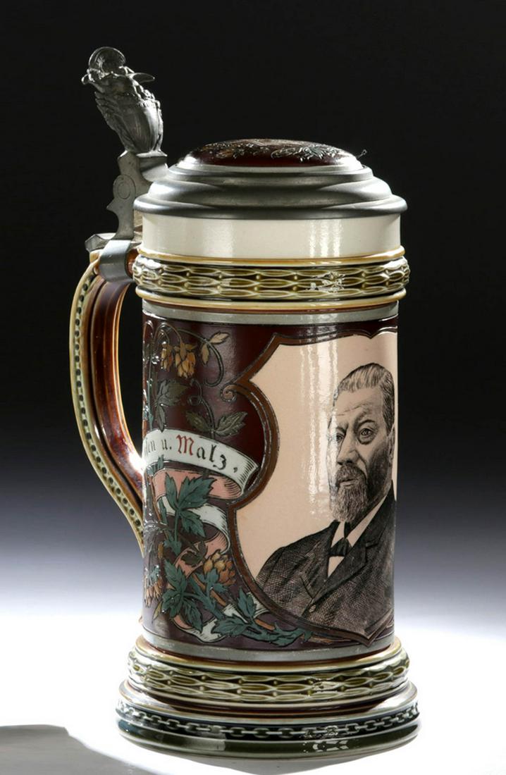 German Beer Stein - Mettlach: **Originally Listed At $400** Europe, Germany, Mettlach, Villeroy & Boch, Mettlach # 1997. Signed by M. Hein. A wonderful antique beer stein, commemorating the George Ehret Brewery and featuring a por