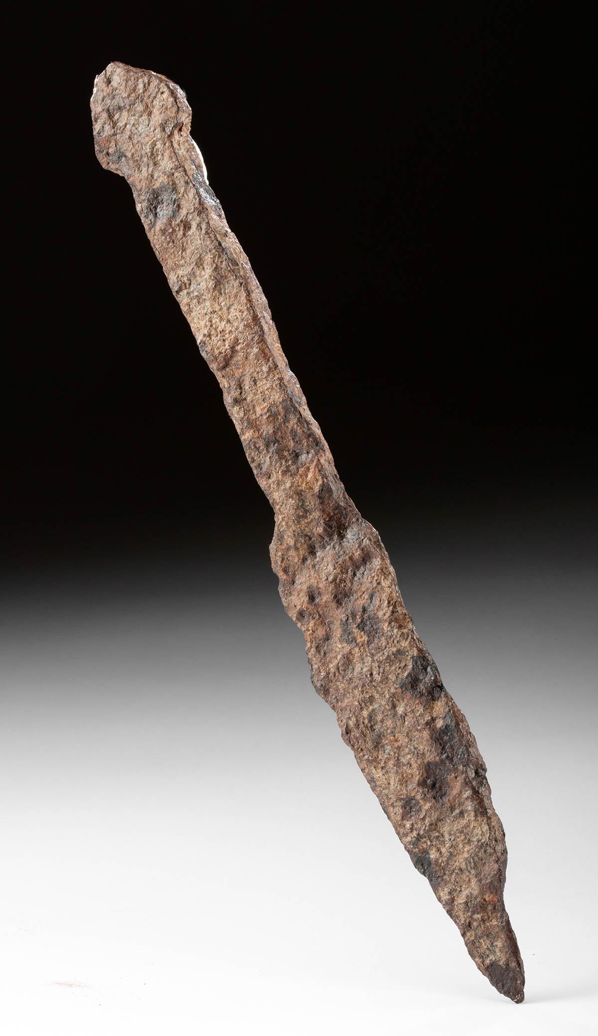 Viking Iron Seax Knife: Northern Europe, Scandinavia, Viking or Norse culture, ca. 8th to 10th century CE. A forged-iron by-knife known as a seax (also sax or scramasax) with a sturdy rectangular handle and a baluster-shaped