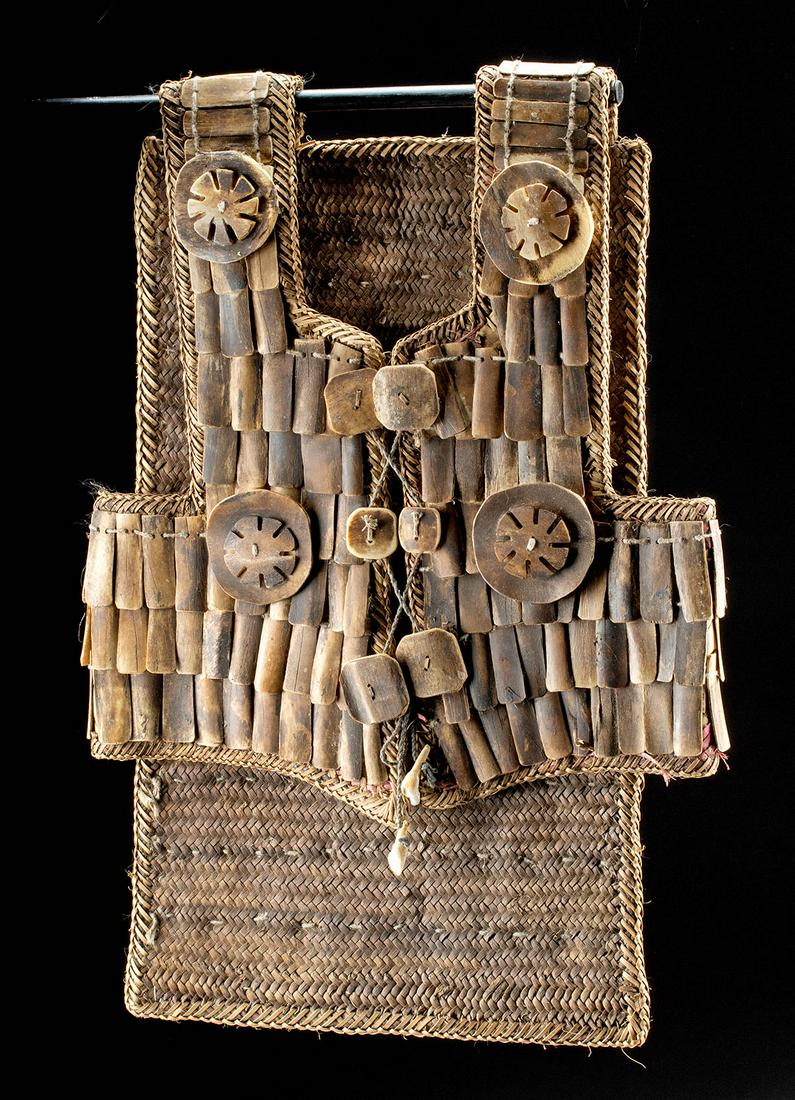 Early 20th C. Torajan Fiber & Bone Armor Vest - Sa'dan: Southeast Asia, Indonesia, Sulawesi Island, Toraja people, ca. first half of the 20th century CE. A beautiful vest known as a sa'dan (literally "war suit") with braided rattan fibers forming the front