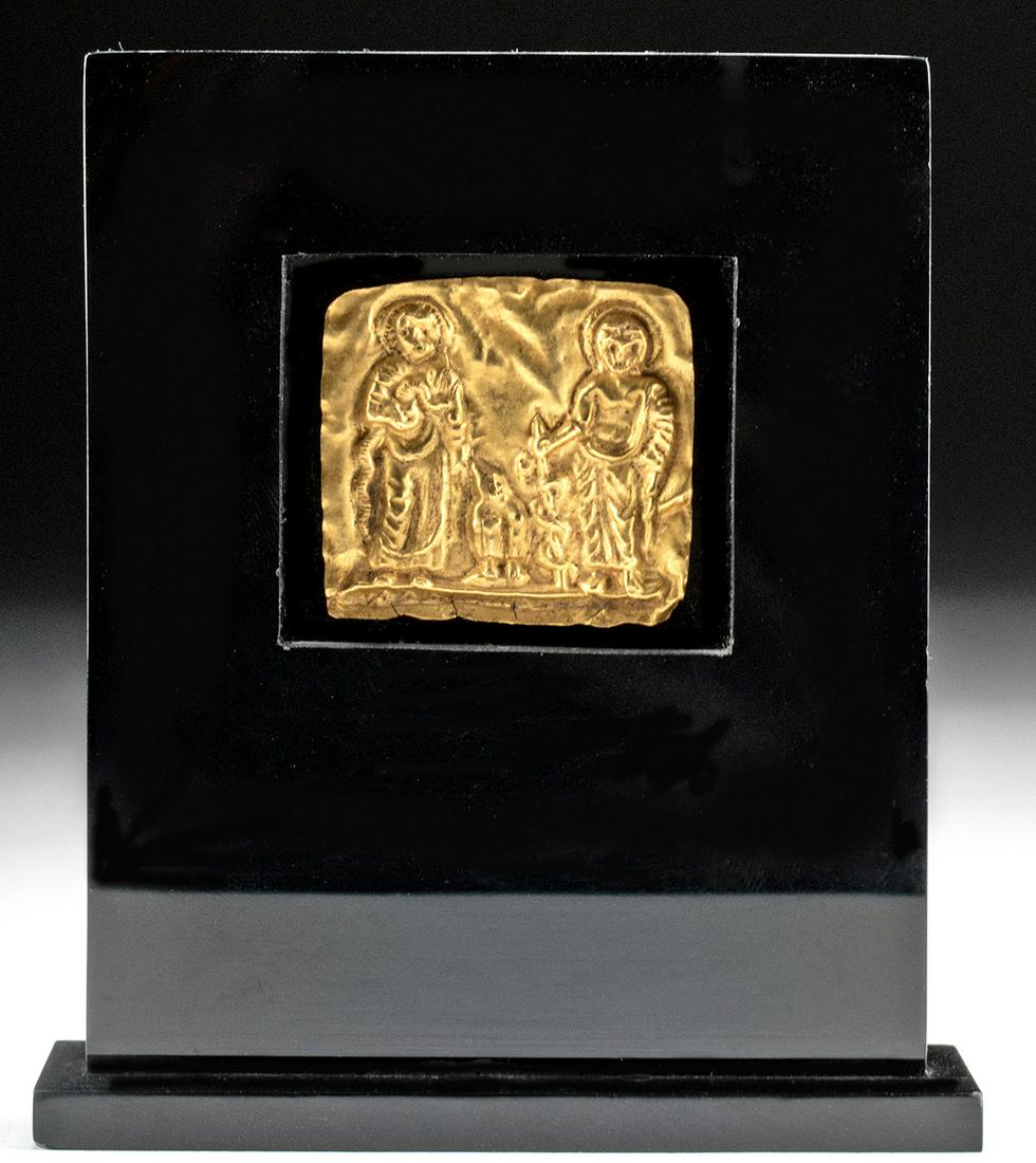 Roman Gold Plaque Asklepios & Hygeia, ex-Royal Athena: Roman, Imperial Period, ca. 3rd to 4th century CE. A very rare 97% gold (equivalent to 22K+) votive plaque depicting Asklepios and Hygeia, the god and goddess of medicine and health, with the eagle of