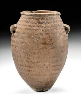 Egyptian Predynastic Naqada II Bichrome Acorn Jar: Ancient Egypt, Predynastic Period, Naqada II, ca. 3500 to 3200 BCE. A beautiful and incredibly early buffware vessel of an elongated form with an acorn-shaped body resting atop a narrow base. The