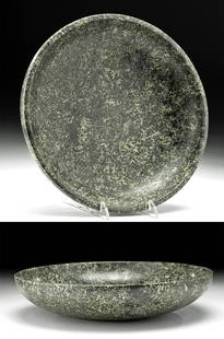 Egyptian Early Dynastic Stone (Gneiss) Bowl: Ancient Egypt, Early Dynastic Period, 1st to 2nd Dynasty, ca. 3100 to 2686 BCE. A fine bowl of a minimalist form carved from gneiss of mottled black, dark gray, light gray, and faint green hues. The