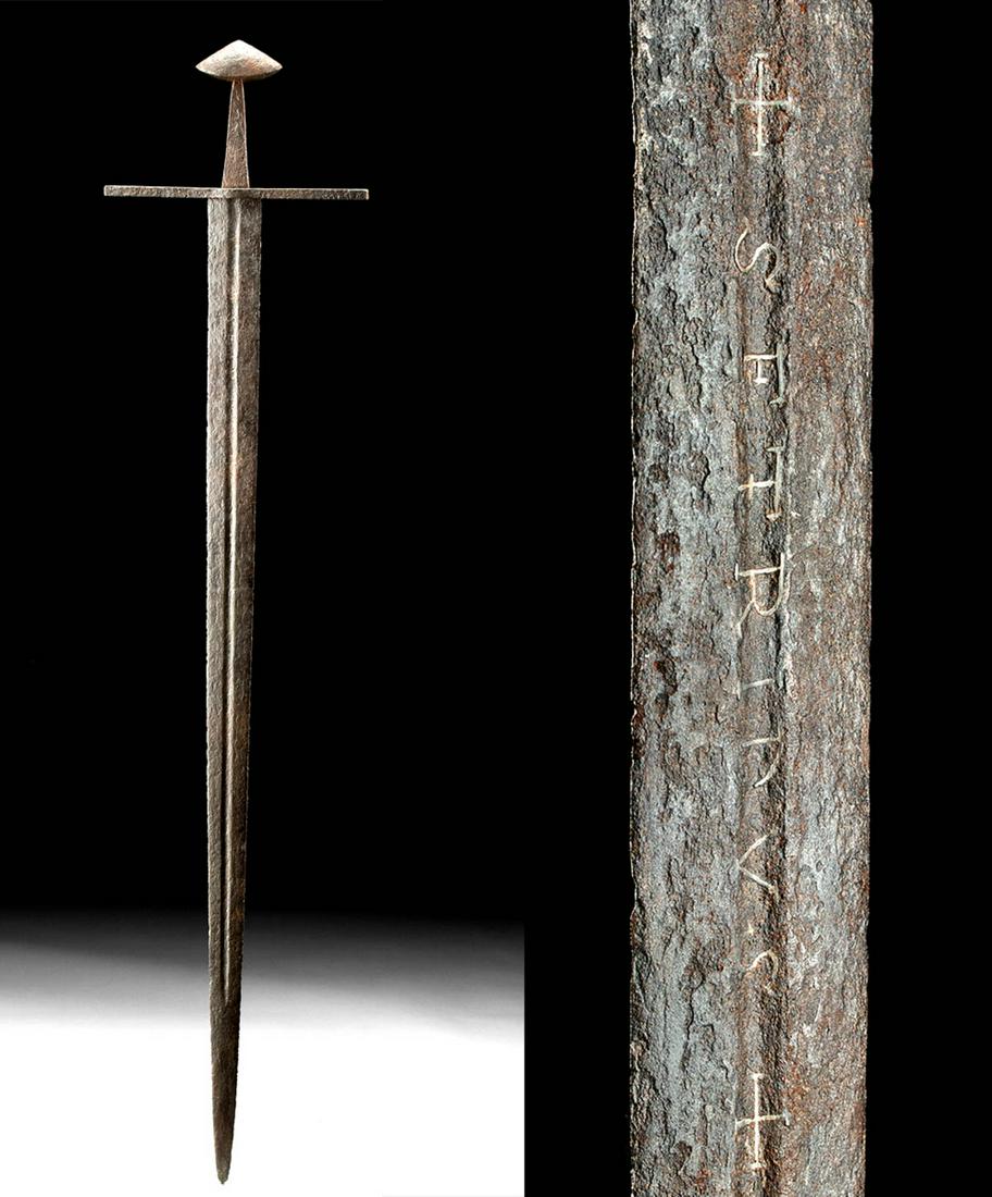 Mid-11th C. Viking Steel Broadsword w/ Silver Inlay: Northern Europe, Scandinavia, late Viking to early Medieval period, ca. mid-11th century CE. A superb broadsword forged from steel that bears a lengthy, double-edged blade that terminates in a sharpen