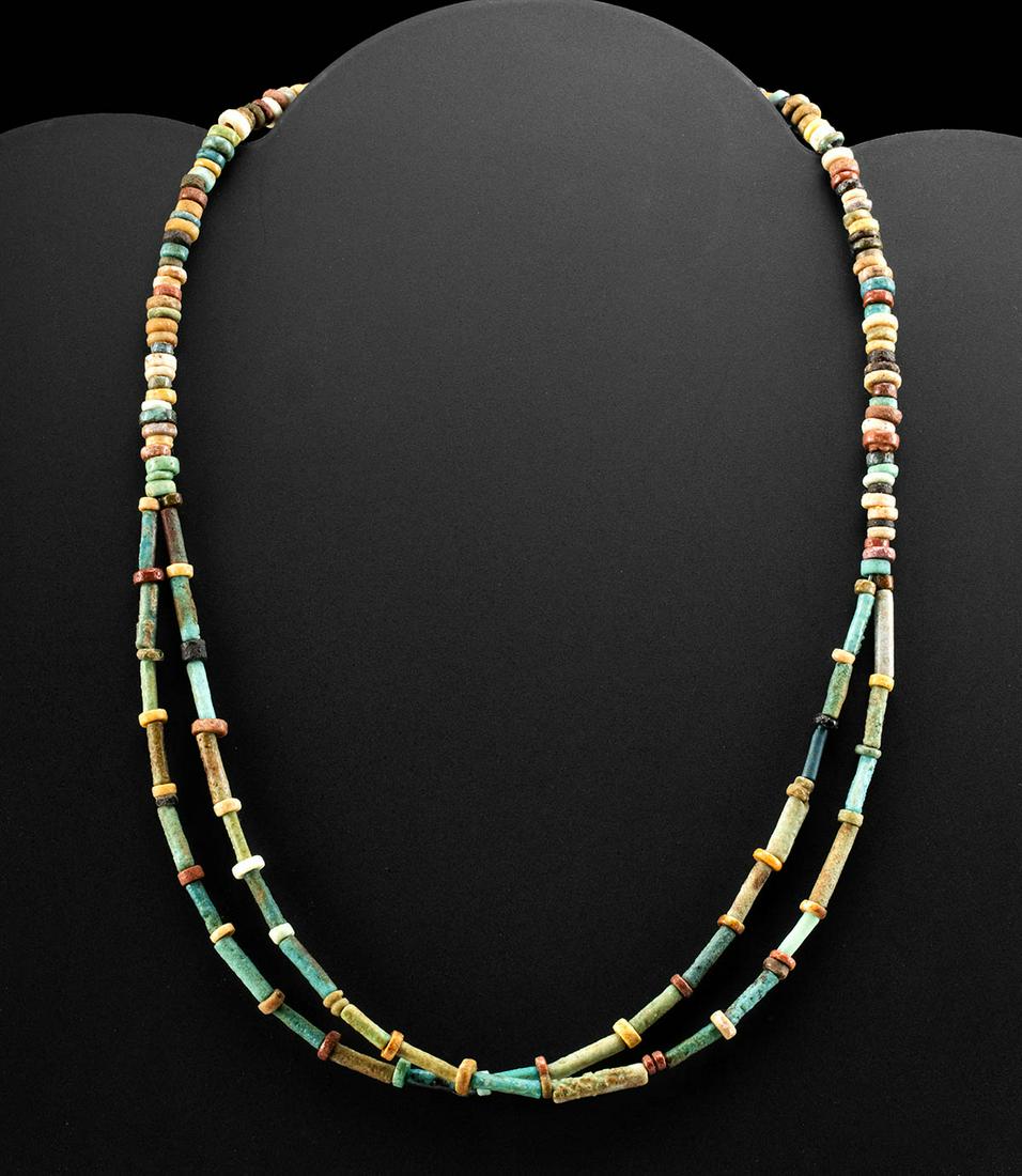 Wearable Egyptian Faience Bead Necklace: **First Time At Auction** Ancient Egypt, Third Intermediate to Late Dynastic Period, 21st to 31st Dynasty, ca. 1070 to 332 BCE. A lovely necklace of a wearable form composed with dozens of petite faie