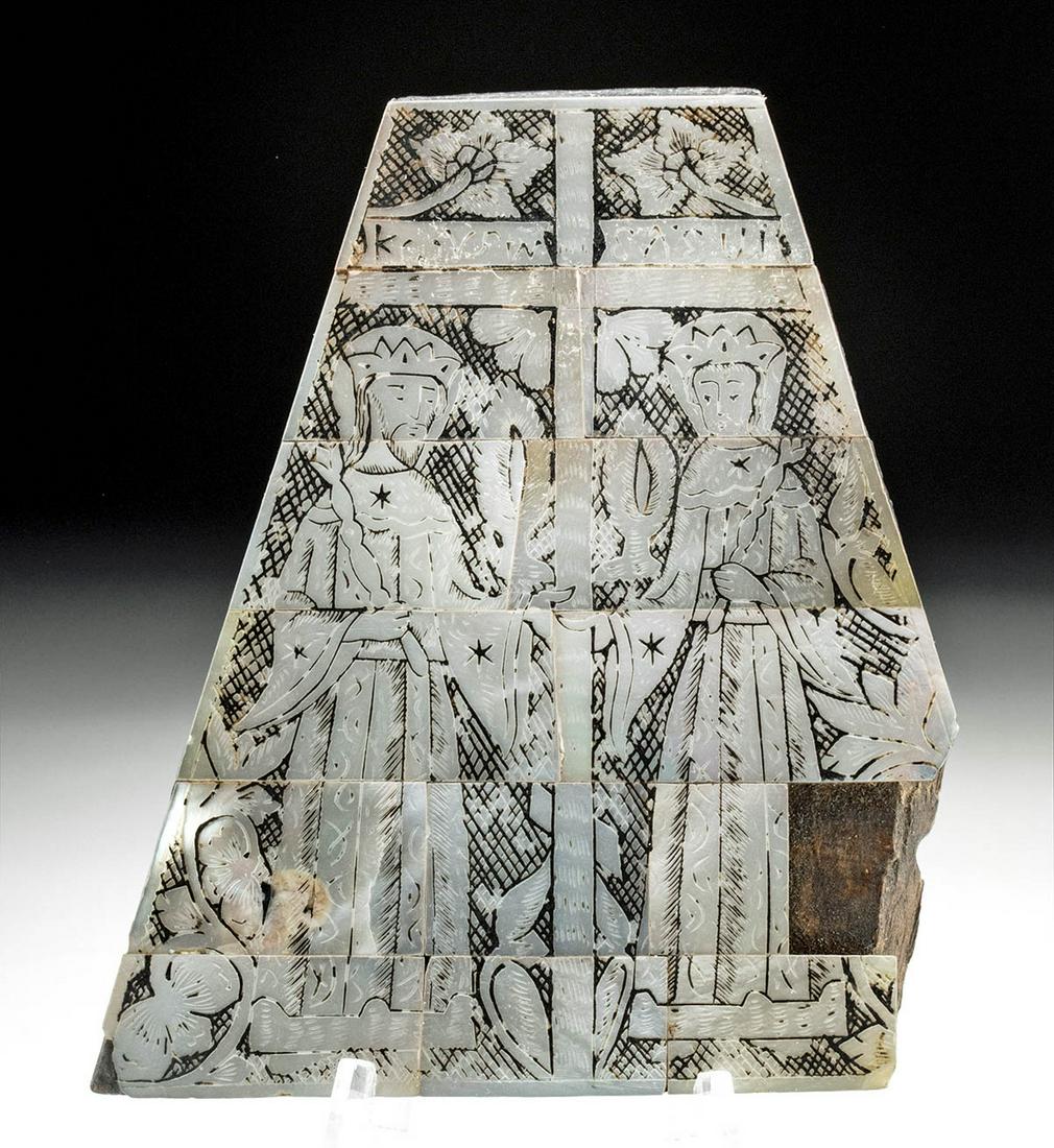 Byzantine Nacre Engraving - St. Constantine, St. Helena: Europe, Byzantine, ca. 300 to 700 CE. An intricately engraved nacre shell plaque on a wooden base of trapezoidal form with petite wooden legs on each corner featuring a central cross flanked by the tw