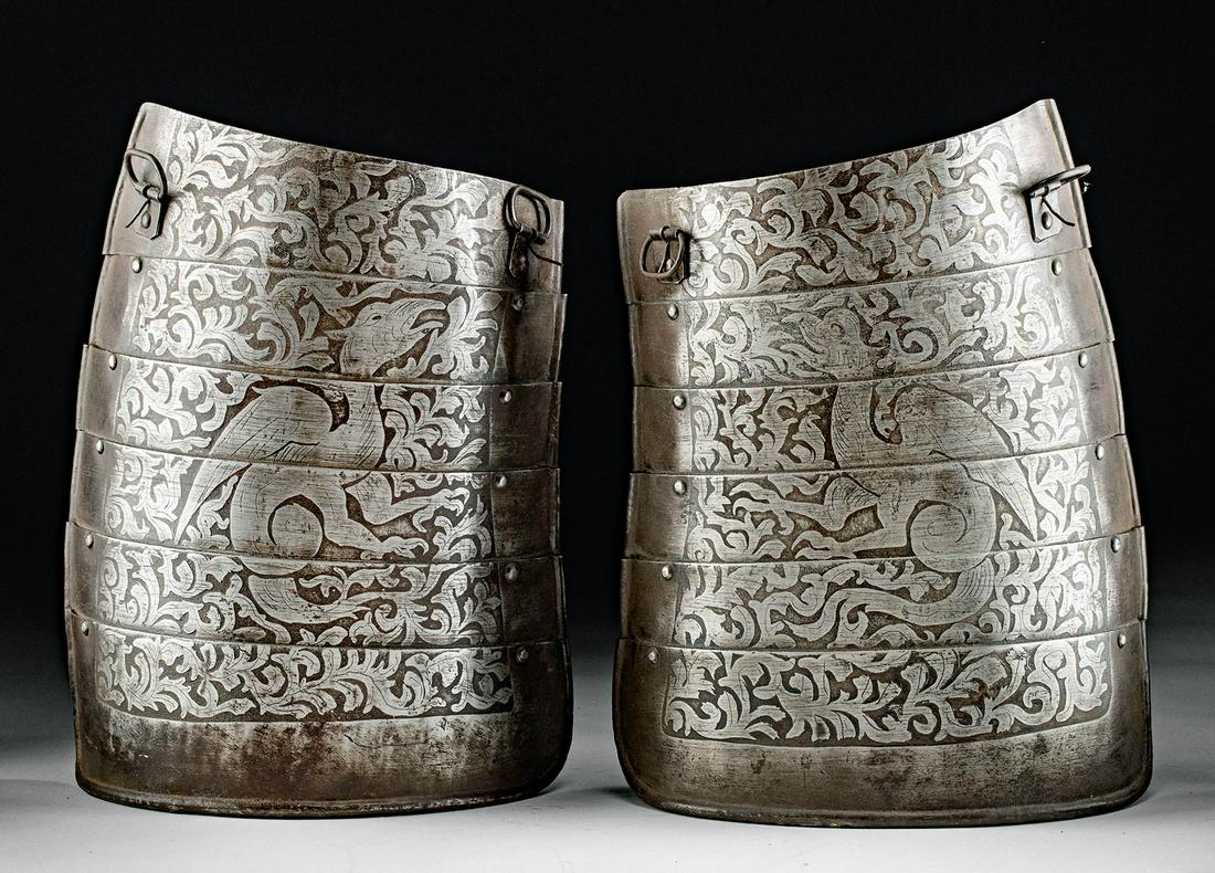 19th. English Steel Armor Tassets Etched Dragons (pr): Western Europe, probably England, Victorian period, ca. 19th century CE. A pair of steel tassets, armor thigh plates, with lovely etched motifs. The tassets are comprised of six plates that are fixed 