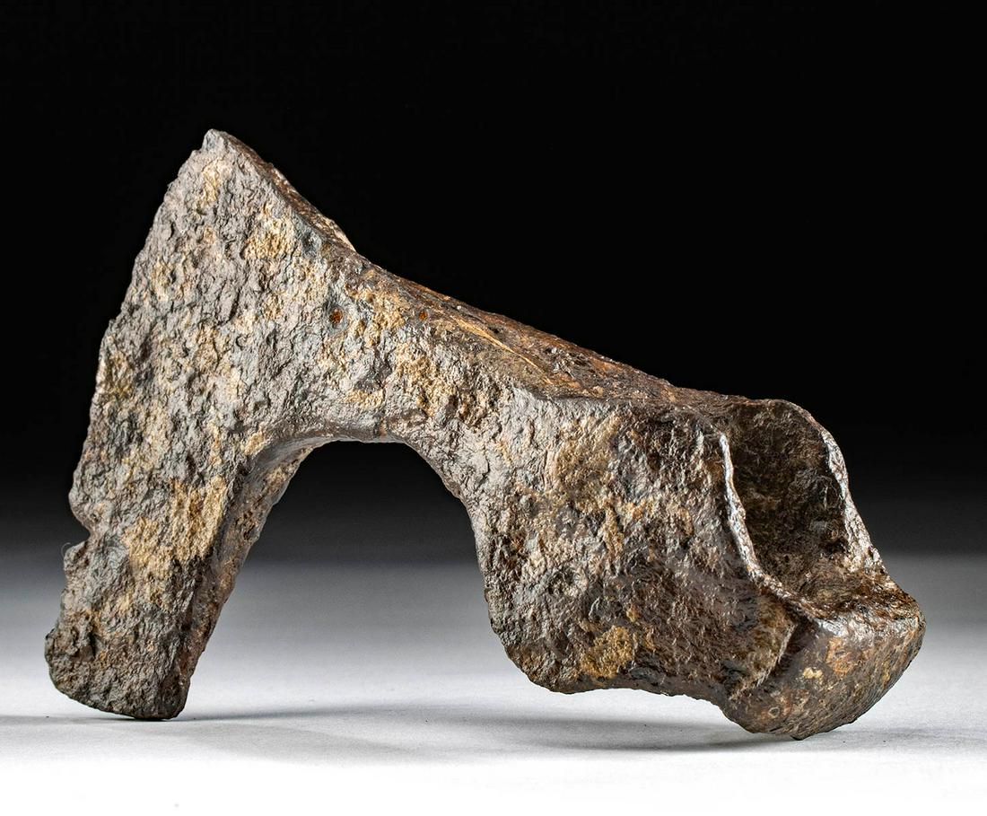 8th C. Viking Iron Bearded Axe Head Skeggox Form: Northern Europe, Scandinavia, Viking or Norse culture, ca. 8th to 11th century CE. A forged-iron axe head of a combat-ready form known as a skeggox (literally "bearded axe") with a thick butt end and 