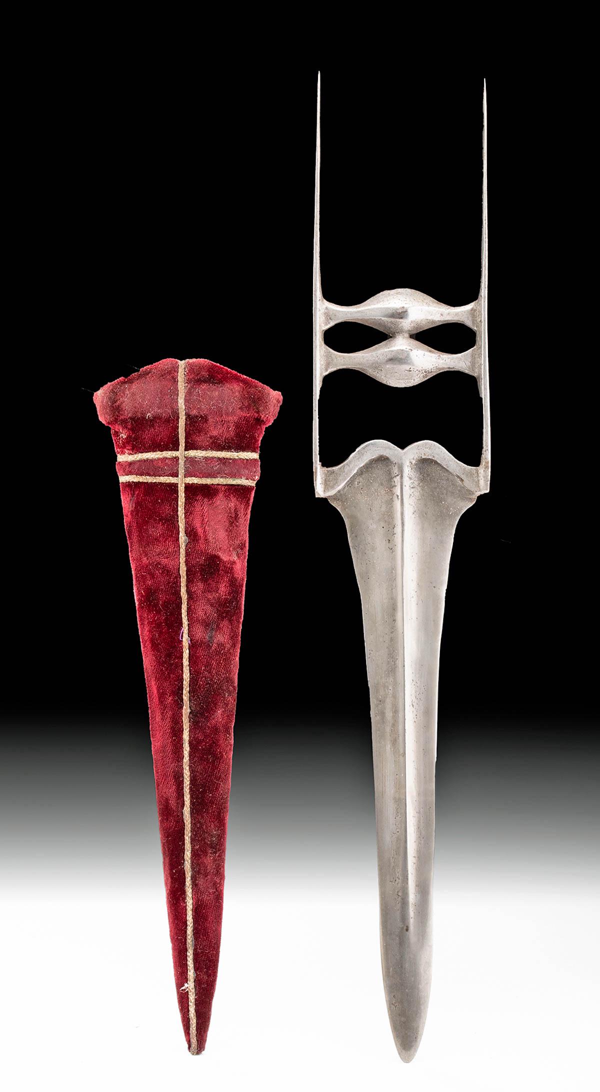 19th C. Indian Steel Katar / Punching Dagger: Central Asia, India, ca. 19th century CE. A forged-steel punching dagger known as a katar with a double-edged blade projecting from the base of an H-shaped handle. Between the narrow lateral bars are 
