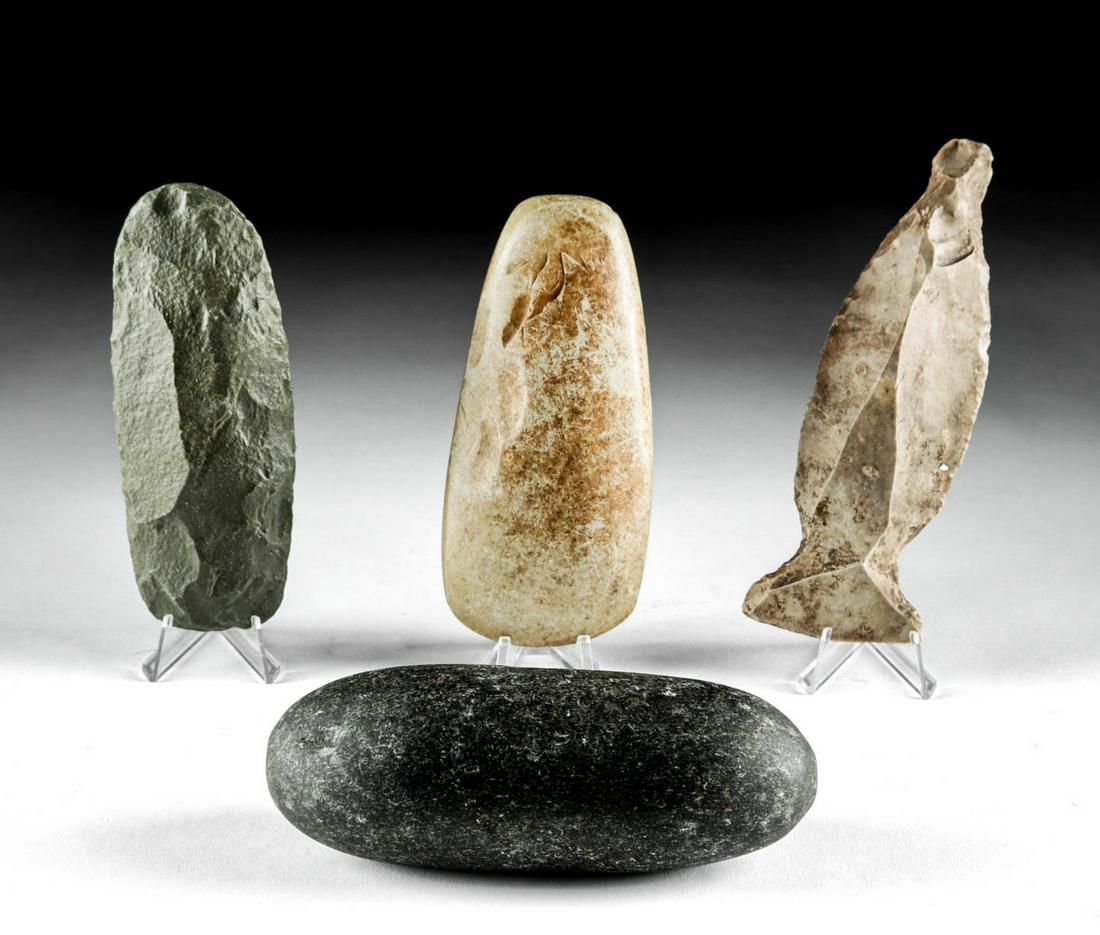 Lot of 4 Native American Woodland Stone Tools: Native American, eastern and midwestern North America, late Archaic to early Woodlands periods, ca. 2000 BCE to 200 CE. Two stone hand axes, one greenstone and one a smoother soapstone, a hard granite