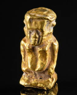 Rare Egyptian Gold Figural Amulet of Pataikos: Egypt, Late Dynastic to Ptolemaic Period, ca. 664 to 30 BCE. A rare example of a petite amulet depicting the dwarf god Pataikos (also Patek, Pataek) formed from a mold-hammered sheet of 97% gold