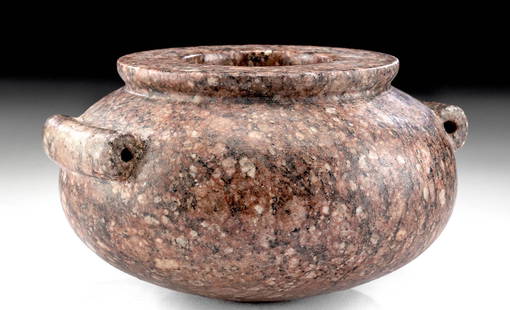 Egyptian Pre-Dynastic Porphyry Vessel: Egypt, end of the Pre-dynastic Period, beginning of the Thinite Period ca. 3100 to 2900 BCE. A beautiful globular vase with a perfectly rounded bottom presenting a simple and elegant design. It was