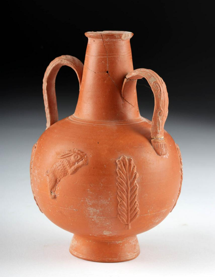 Roman North Africa Redware Amphoriskos w/ Rabbit & Lion: Roman, North Africa, Imperial Period, ca. 3rd to 4th century CE. A lovely wheel-thrown redware pottery amphoriskos with a concave footed base, a spherical body with a rounded shoulder, a projecting co
